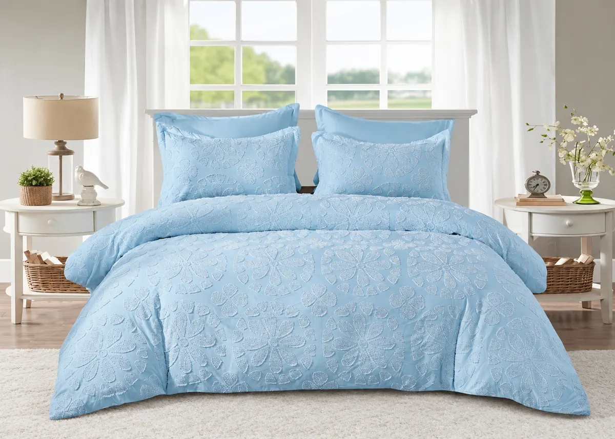 Blue quilt from the Ritu Collection home textile range