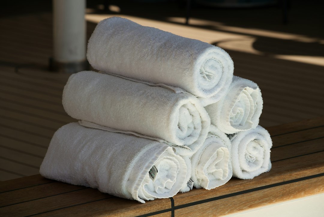 Stacked white towels for salon hotel and resort use